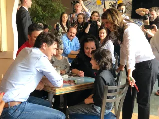 Julie with PM Trudeau meeting with the community.